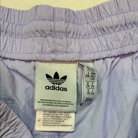 Adidas Purple Athletic Shorts with Signature Stripes - Picture 2 of 9